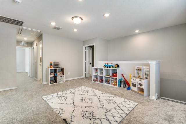 rec room with light carpet