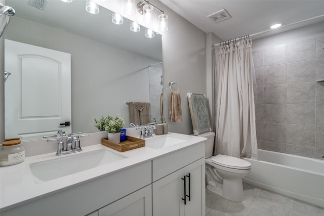 full bathroom with dual vanity, toilet, shower / tub combo with curtain, and tile patterned flooring