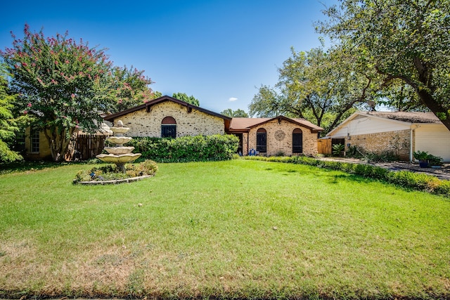 view of front of property with a front yard