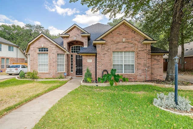 front of property with a front yard