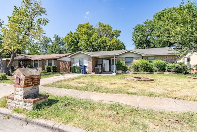 ranch-style home with a front yard