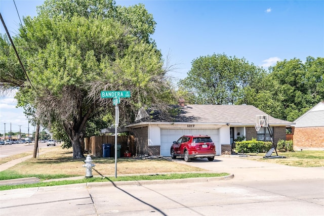 single story home with a garage