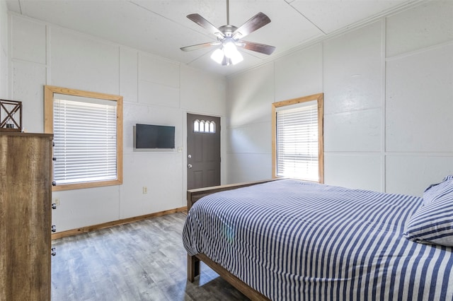 bedroom with wood-type flooring