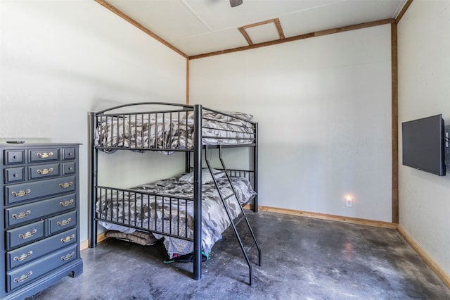 bedroom featuring concrete floors