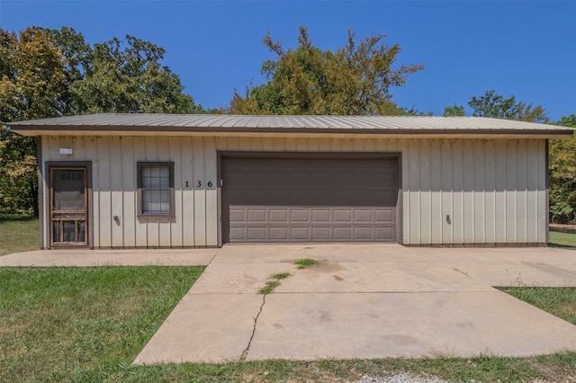 garage with a lawn