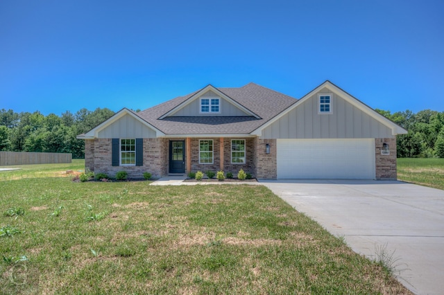 craftsman-style home featuring a garage and a front lawn