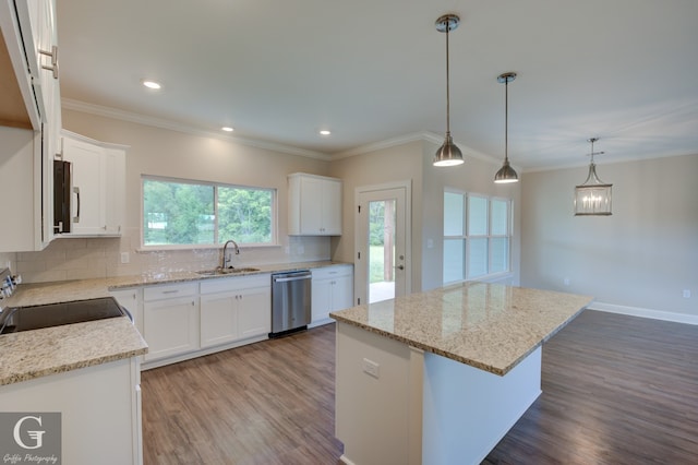 kitchen with tasteful backsplash, range, stainless steel dishwasher, light stone counters, and hardwood / wood-style floors