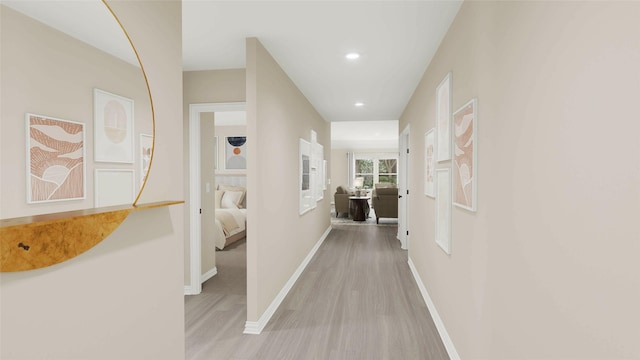 hallway with light wood-type flooring