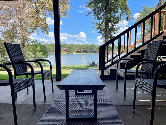 exterior space featuring a water view and stairway