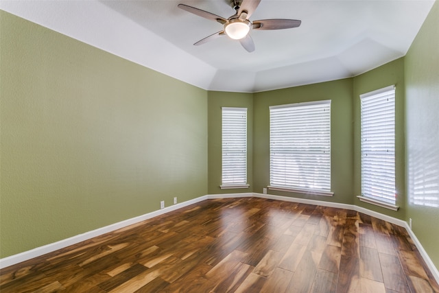 unfurnished room featuring dark hardwood / wood-style flooring and ceiling fan