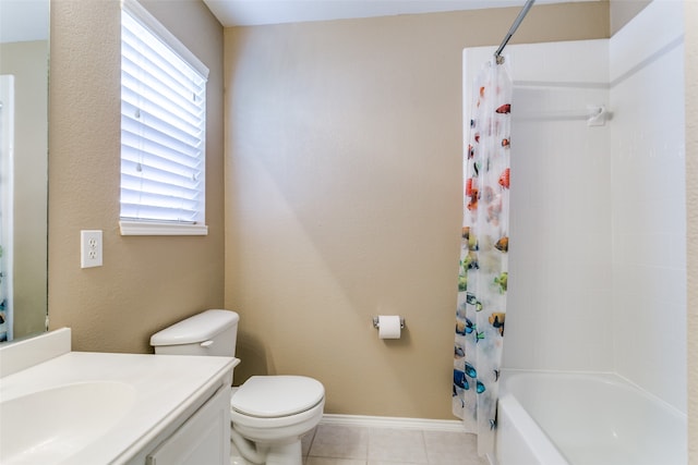 full bathroom with tile patterned flooring, vanity, toilet, and shower / bath combo with shower curtain