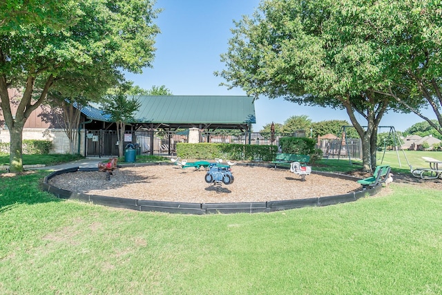 view of playground with a yard