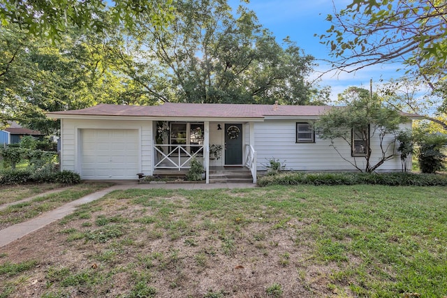 single story home with a front lawn and a garage