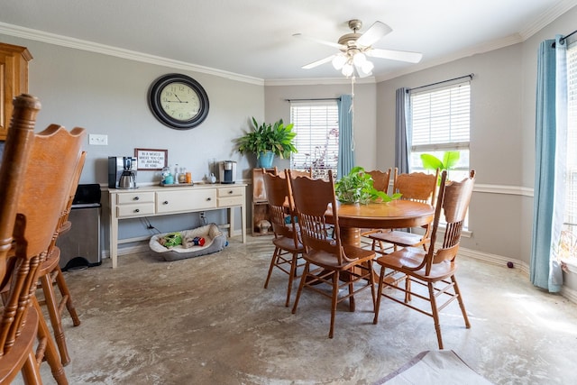 dining room with ceiling fan and crown molding