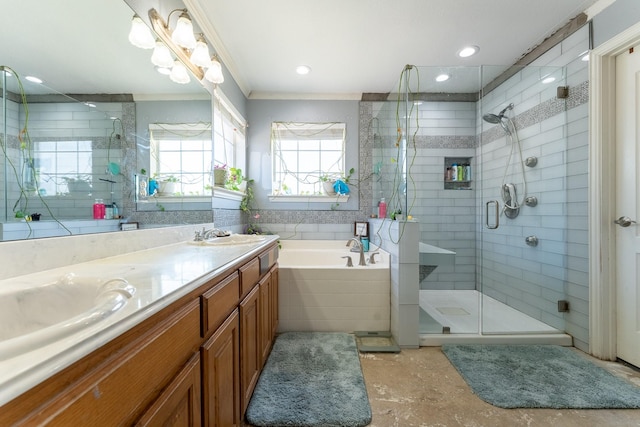 bathroom featuring crown molding, vanity, and shower with separate bathtub