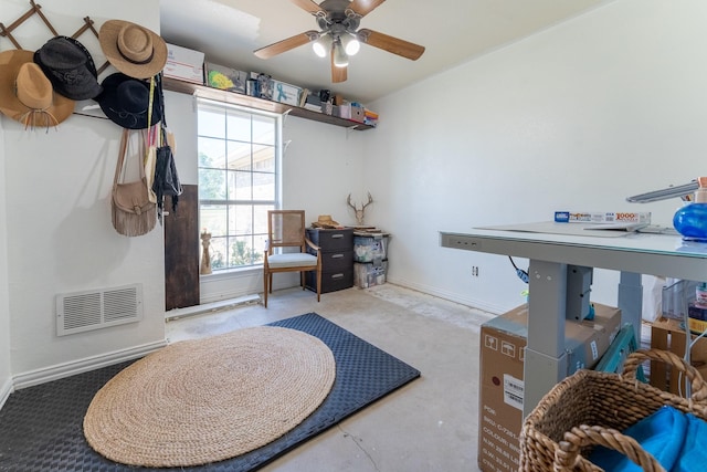 interior space with ceiling fan