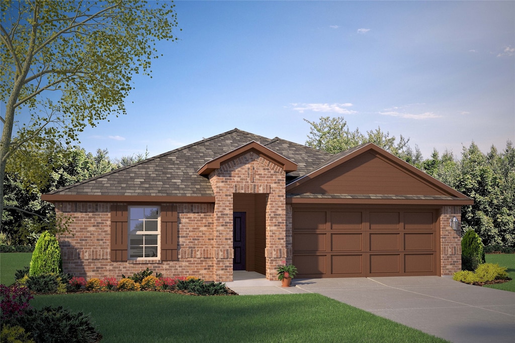 view of front of property featuring a front yard and a garage