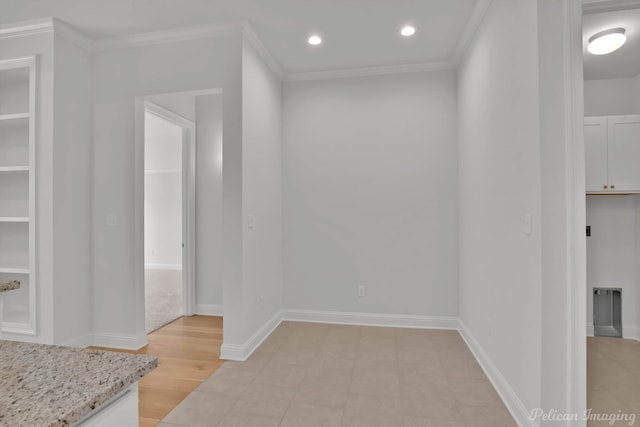 tiled empty room with ornamental molding