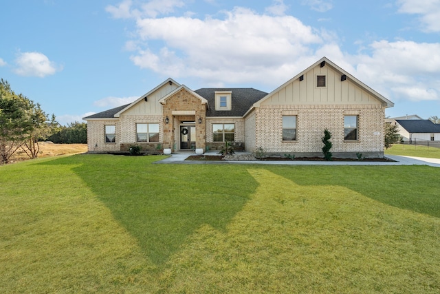 craftsman-style home featuring a front lawn