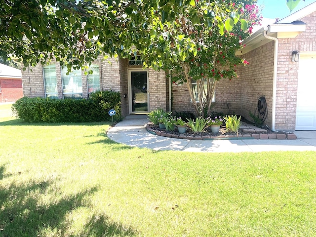 view of front of property with a front lawn