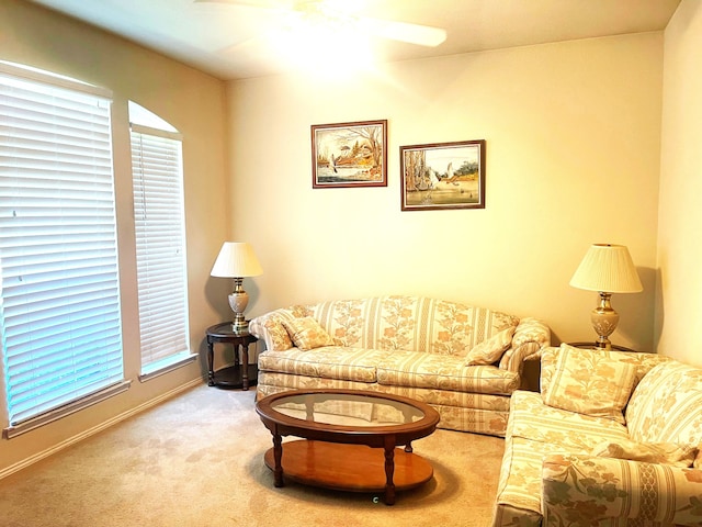 living room with carpet and ceiling fan