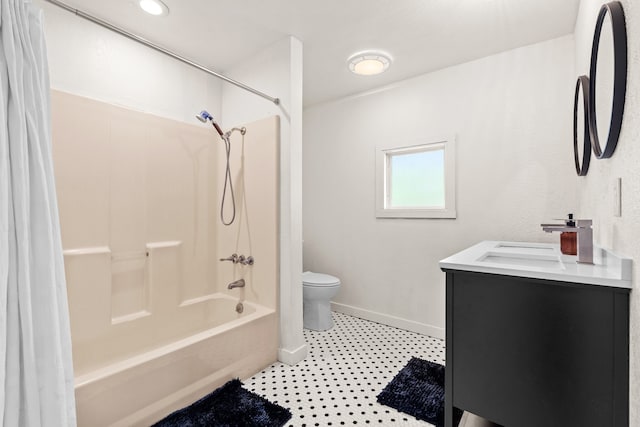 full bathroom featuring tile patterned floors, vanity, shower / bath combination with curtain, and toilet