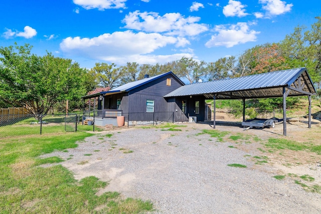 view of front of property with a carport