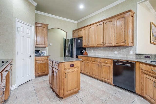 kitchen with black dishwasher, backsplash, crown molding, and light tile patterned floors