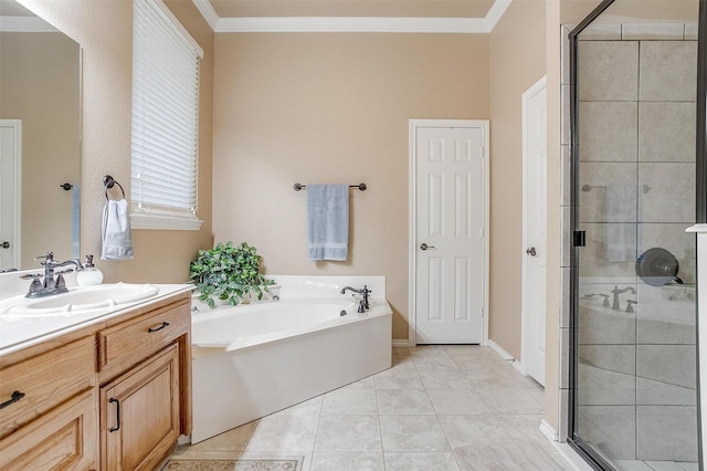 bathroom with ornamental molding, vanity, tile patterned flooring, and separate shower and tub