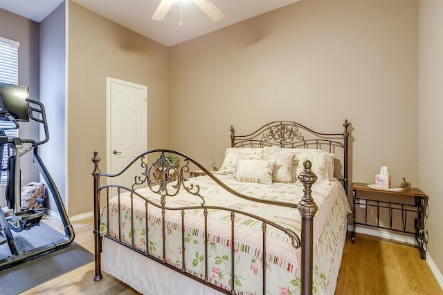 bedroom featuring ceiling fan and light wood-type flooring