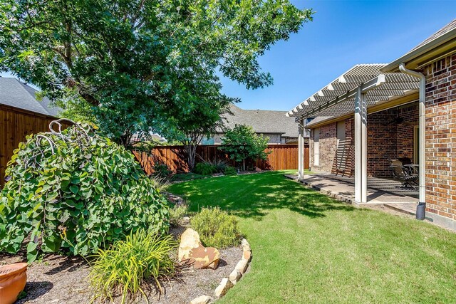 view of yard featuring a pergola and a patio