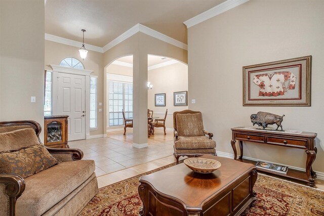 tiled living room featuring crown molding