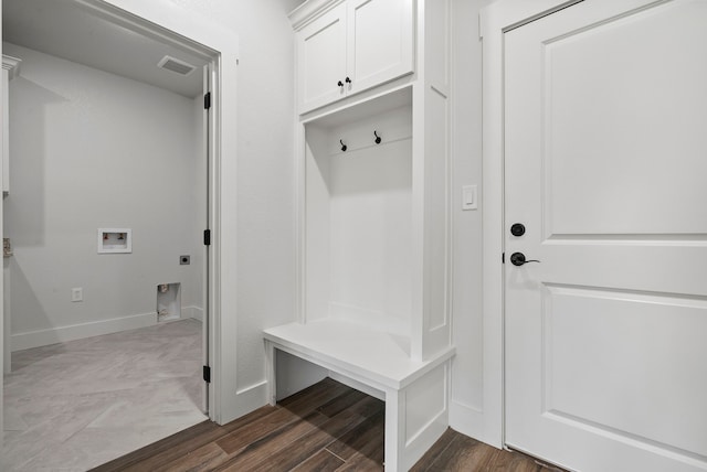 mudroom featuring dark wood-type flooring