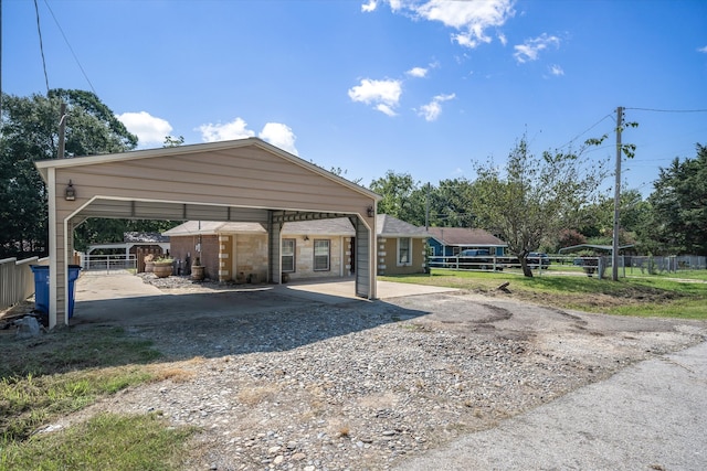 view of car parking featuring a carport