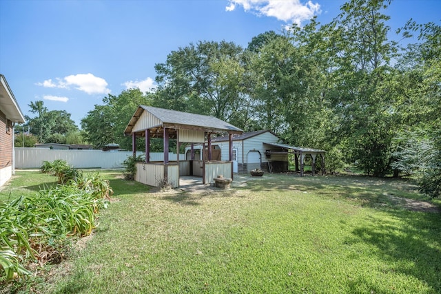 view of yard featuring a carport