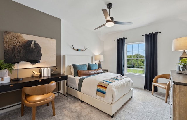 bedroom with light colored carpet and ceiling fan