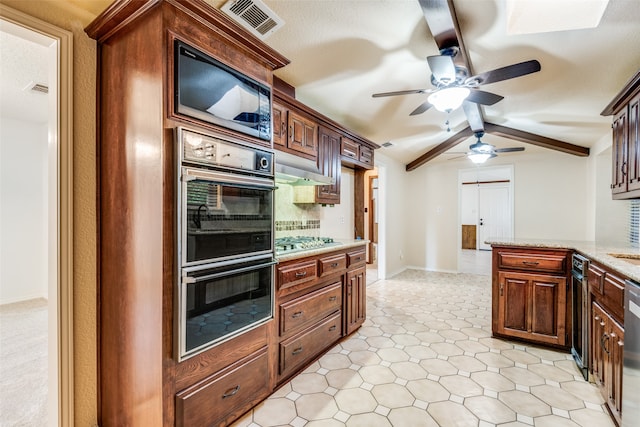 kitchen featuring beamed ceiling, black appliances, a textured ceiling, light tile patterned floors, and ceiling fan