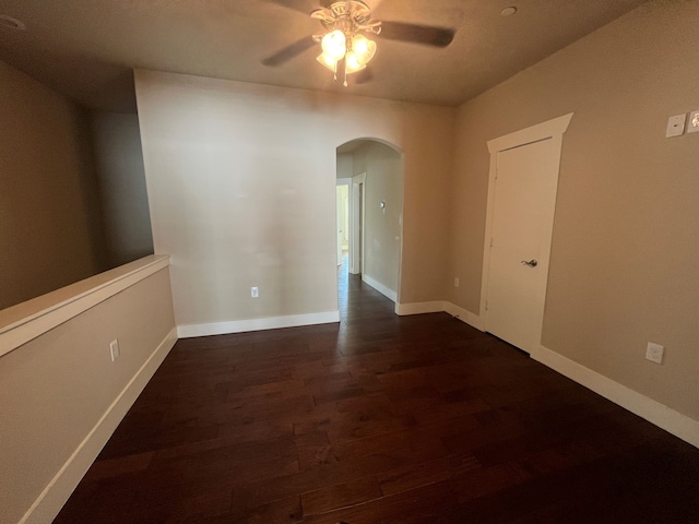 unfurnished room with ceiling fan and hardwood / wood-style floors