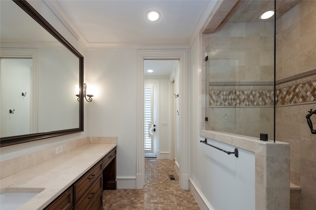 hallway featuring a towering ceiling, an inviting chandelier, and hardwood / wood-style floors