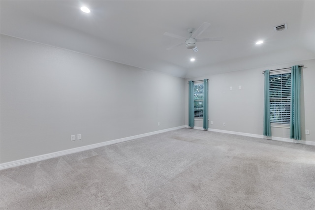 carpeted empty room featuring ceiling fan