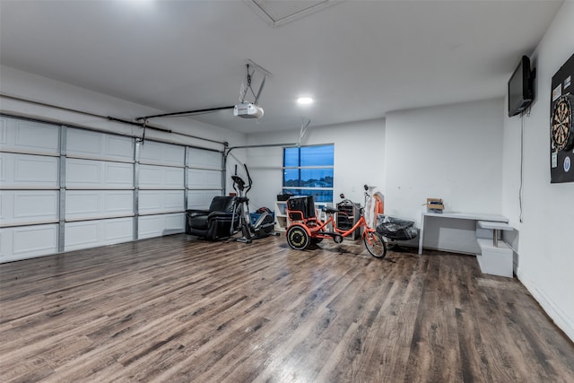 garage featuring a garage door opener