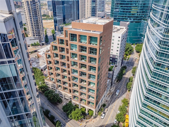 birds eye view of property featuring a city view