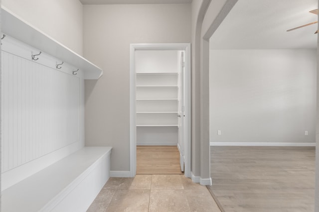 mudroom with light hardwood / wood-style floors