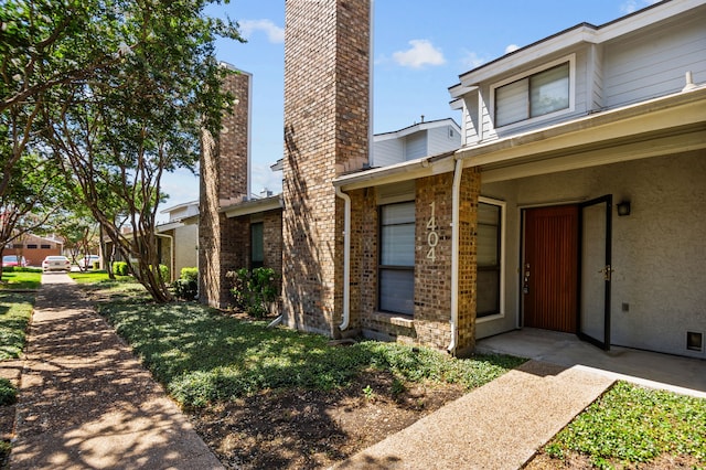 exterior space with a front lawn