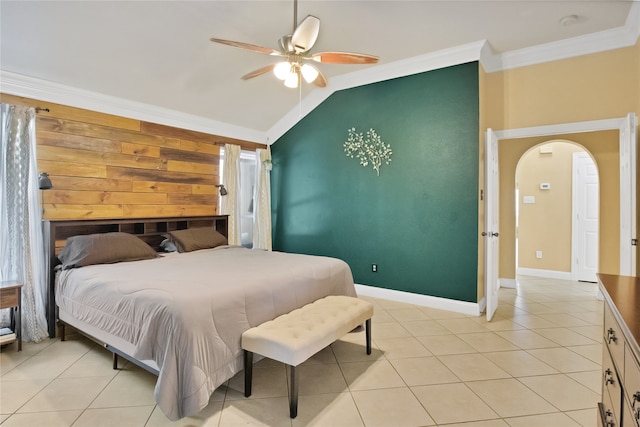 bedroom with ceiling fan, light tile patterned floors, vaulted ceiling, and ornamental molding