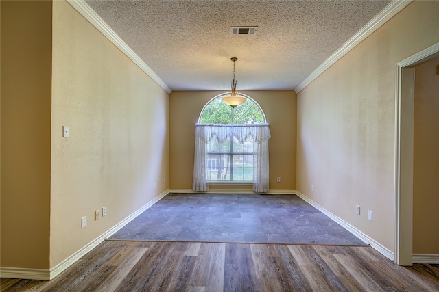 interior space with crown molding and a textured ceiling