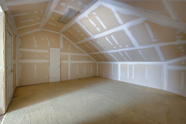 bonus room with vaulted ceiling