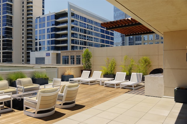 view of patio featuring a balcony