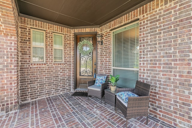 property entrance with a patio