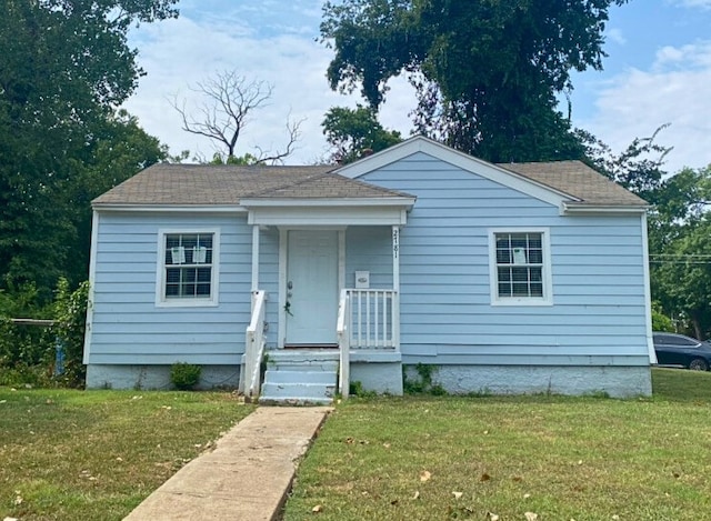 bungalow with a front lawn